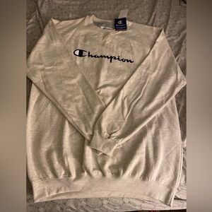 Men’s champion sweatshirt. Size XL tall. NWT. Color is a cream/grey.